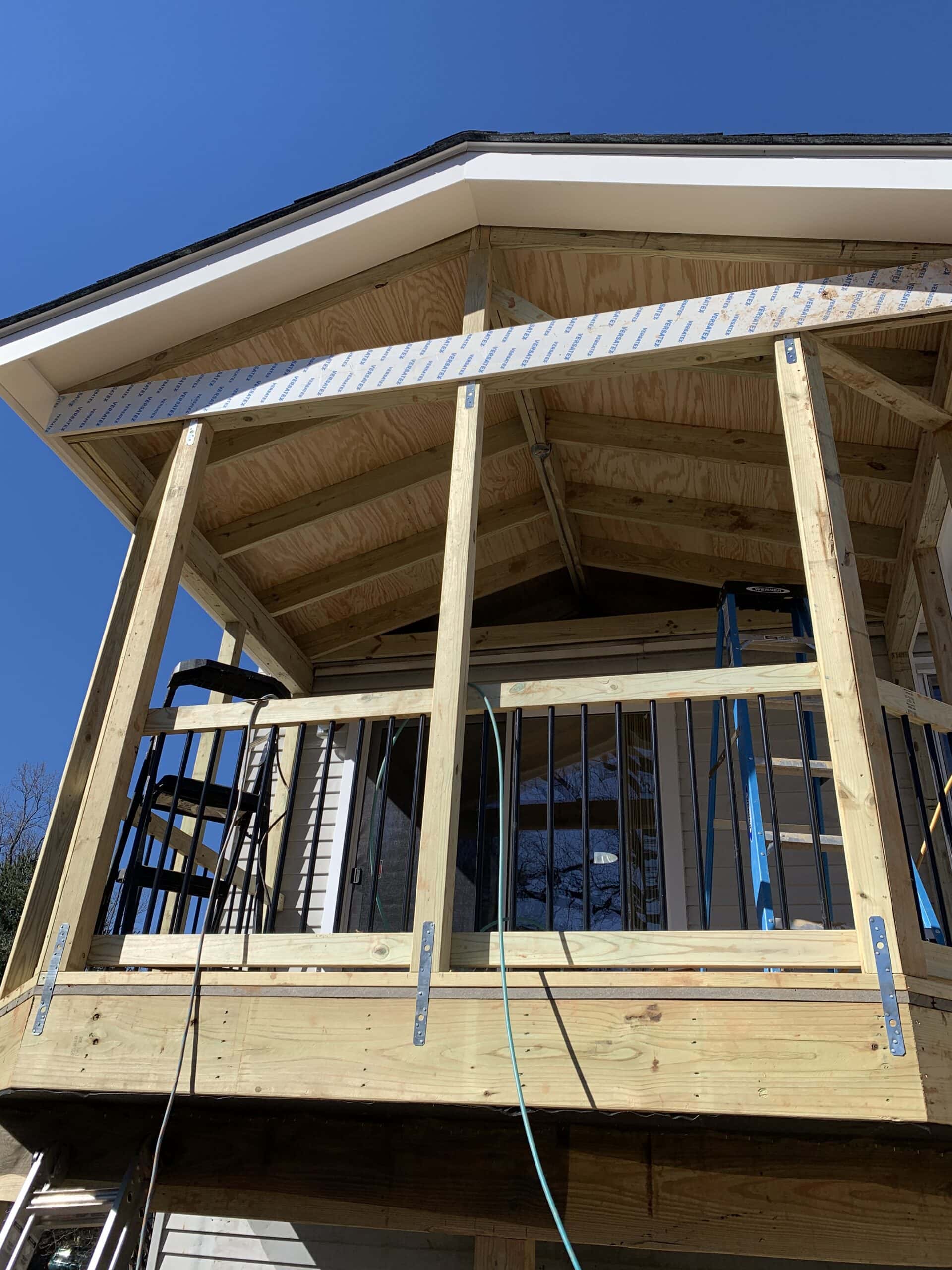 A porch is being built on a house.