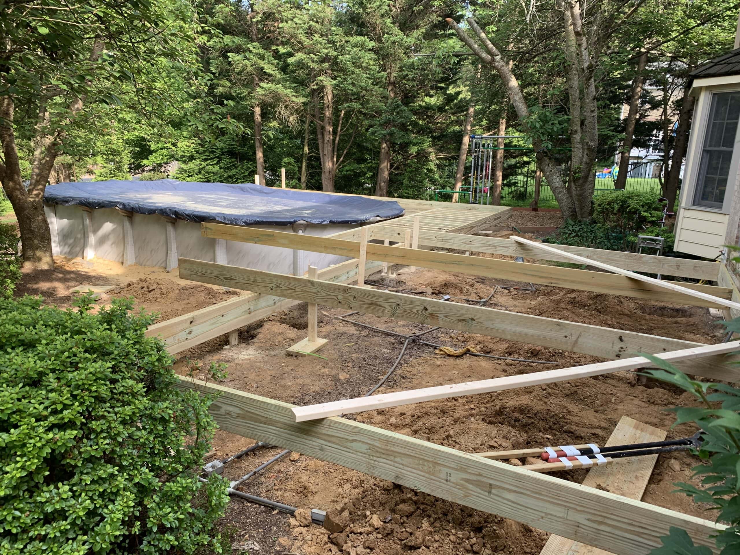 Initial framing and groundwork in progress for Trex composite deck installation