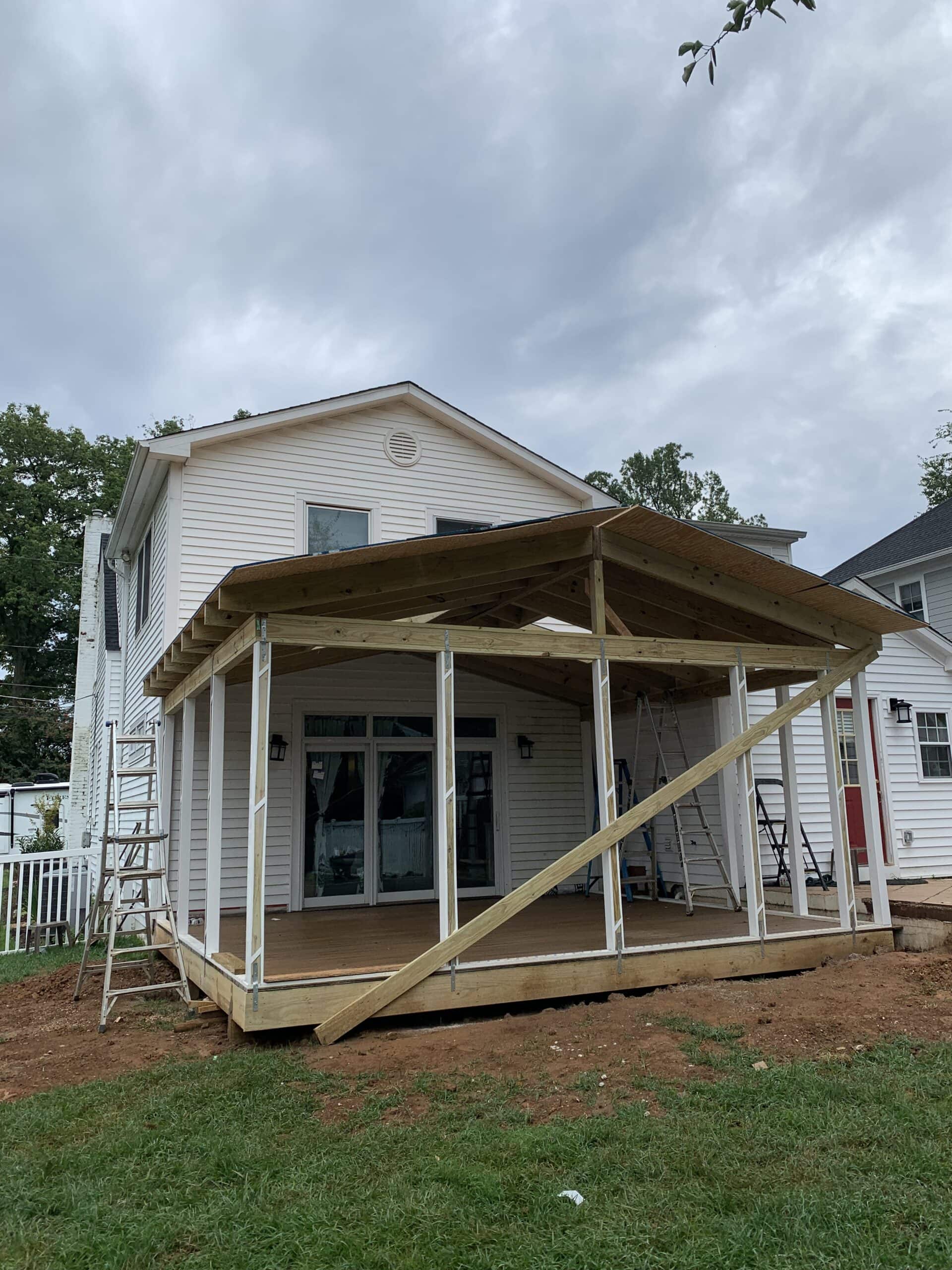 A porch is being built on a house.
