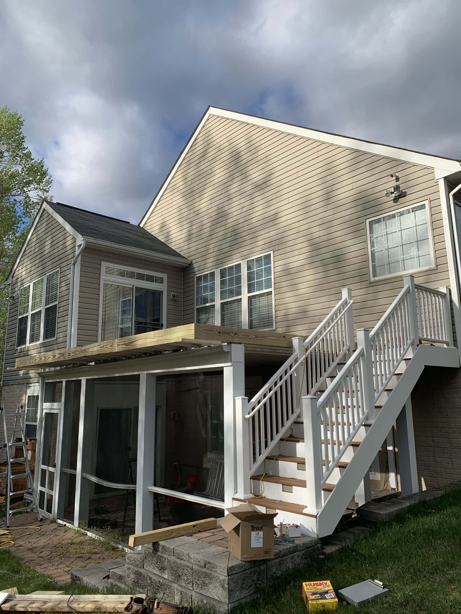 Side view of early porch framing aligning with the existing roofline