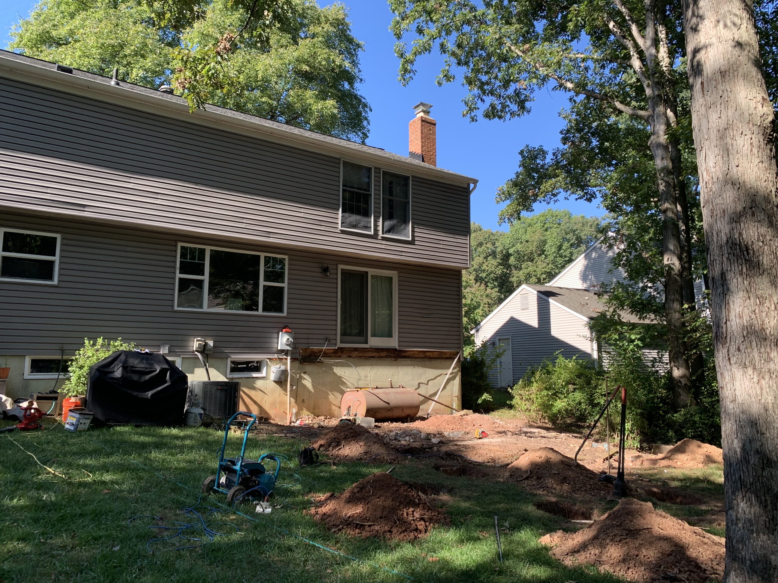 A house with a tree in the yard