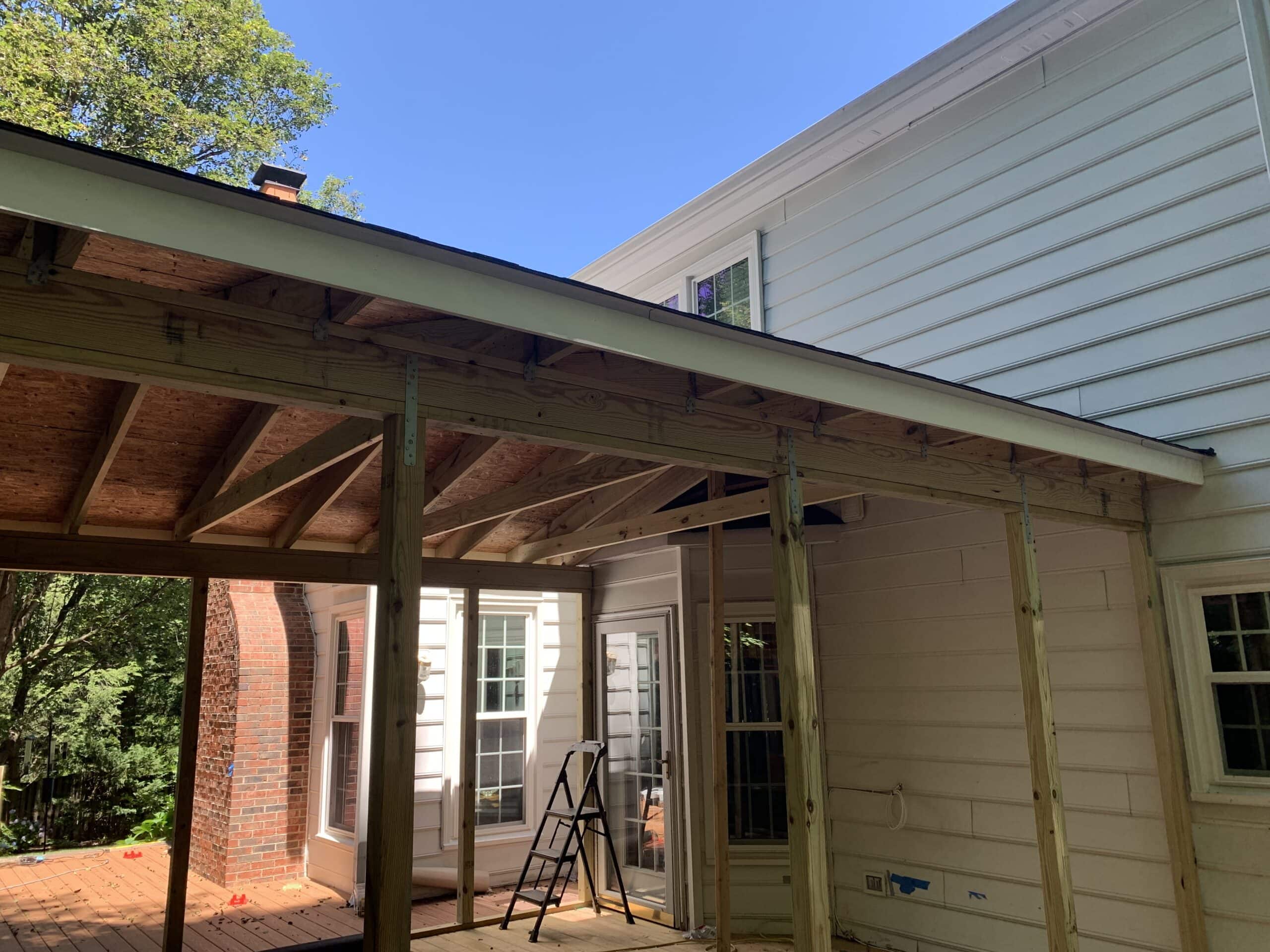 A porch is being built on a house.