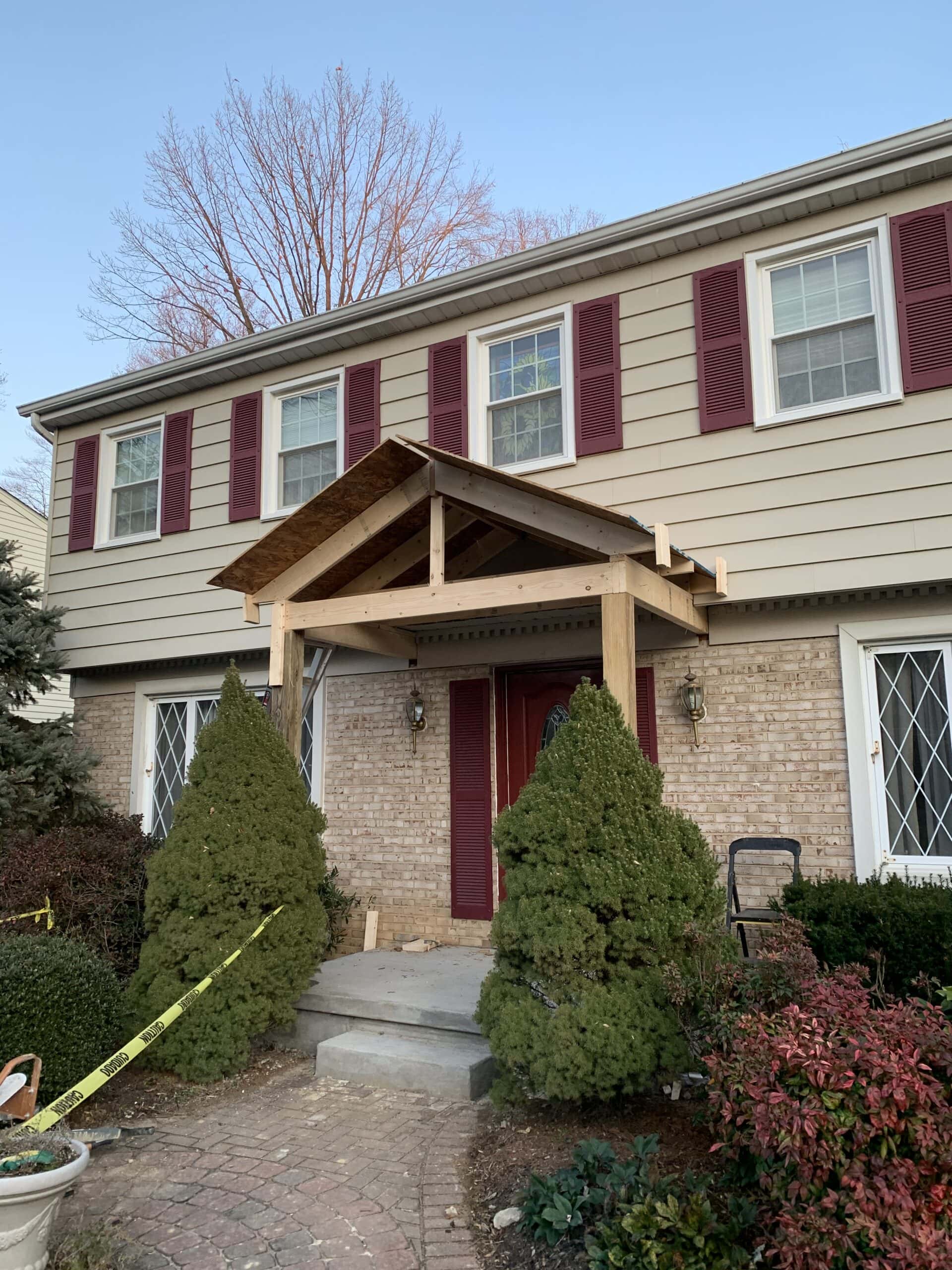 porch frame built over front door of a house