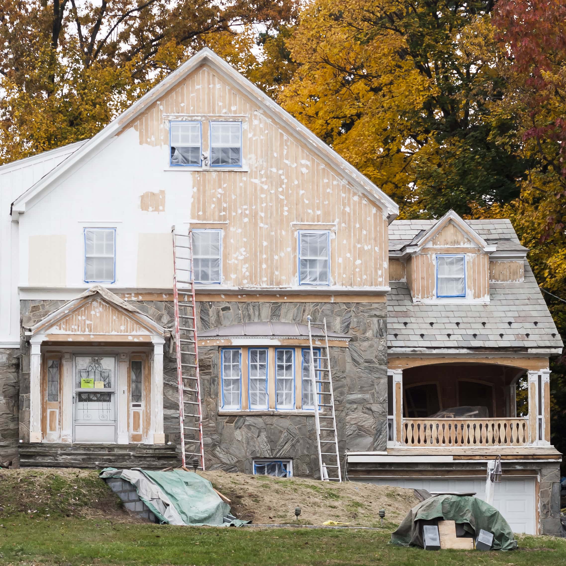 Exterior of House Being Painted