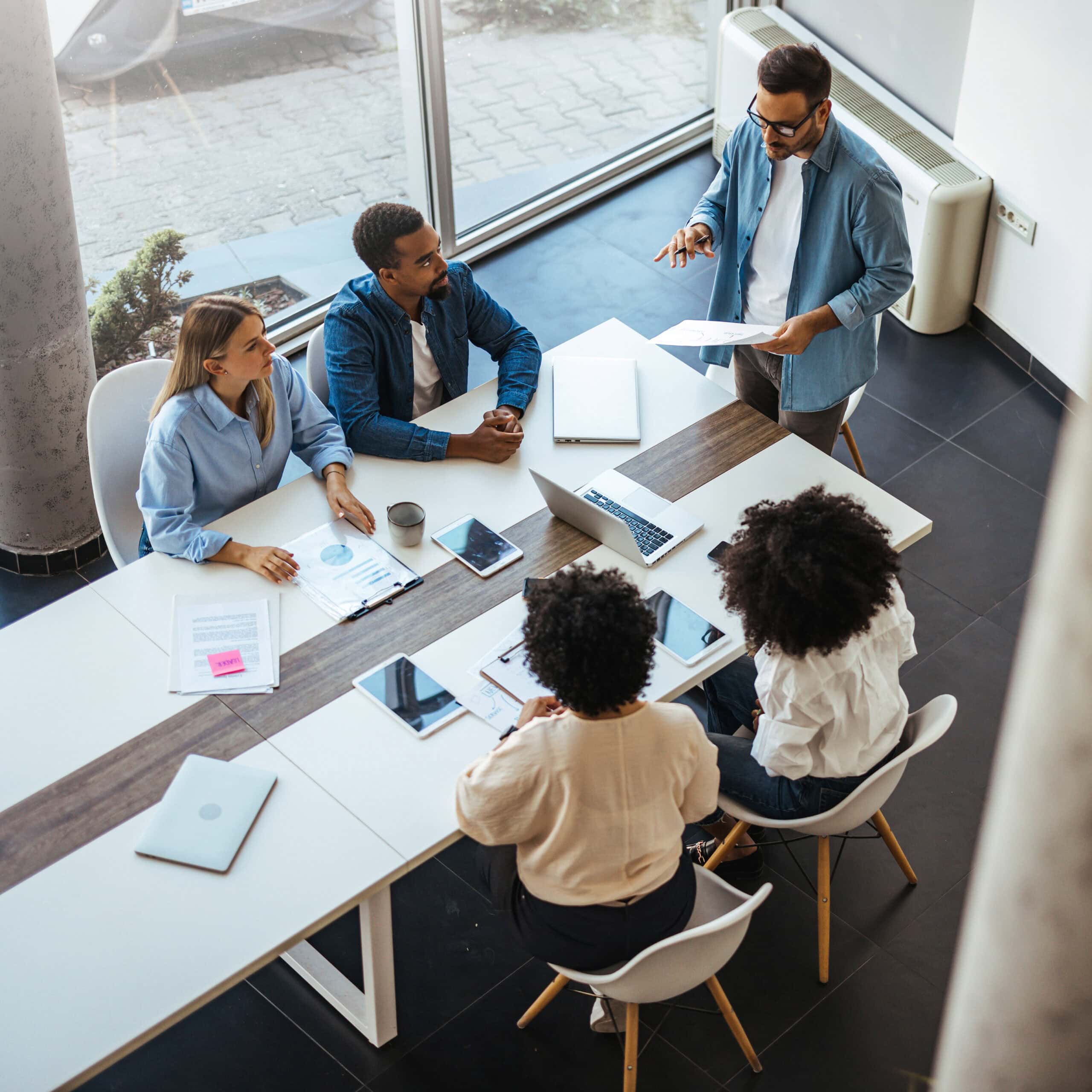 Diverse Team in a Business Meeting Collaborating on Projects
